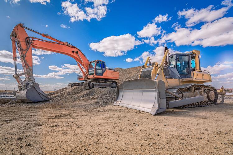 Graafmachine en bulldozer